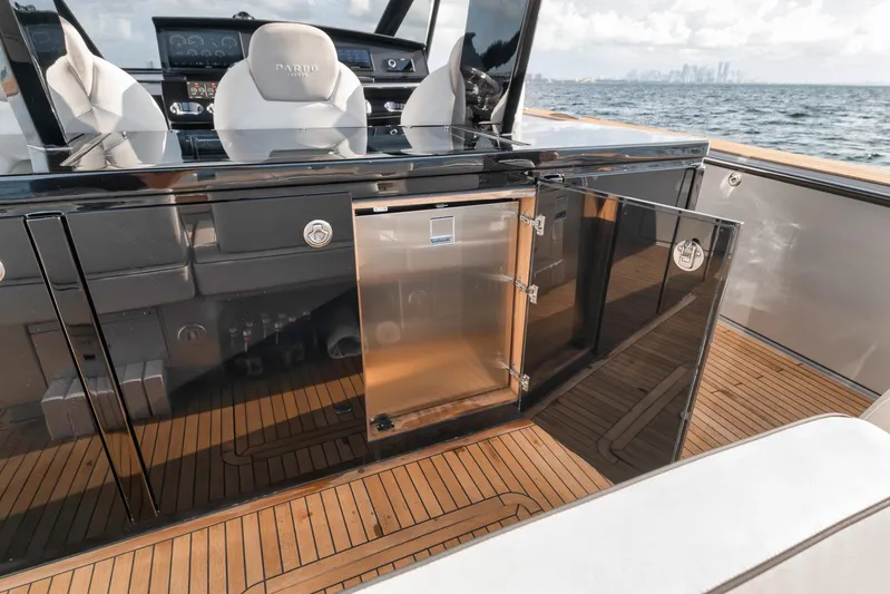  Yacht Photos Pics 2022 Pardo Yachts 43 interior with sleek design and open cabinet on teak deck.