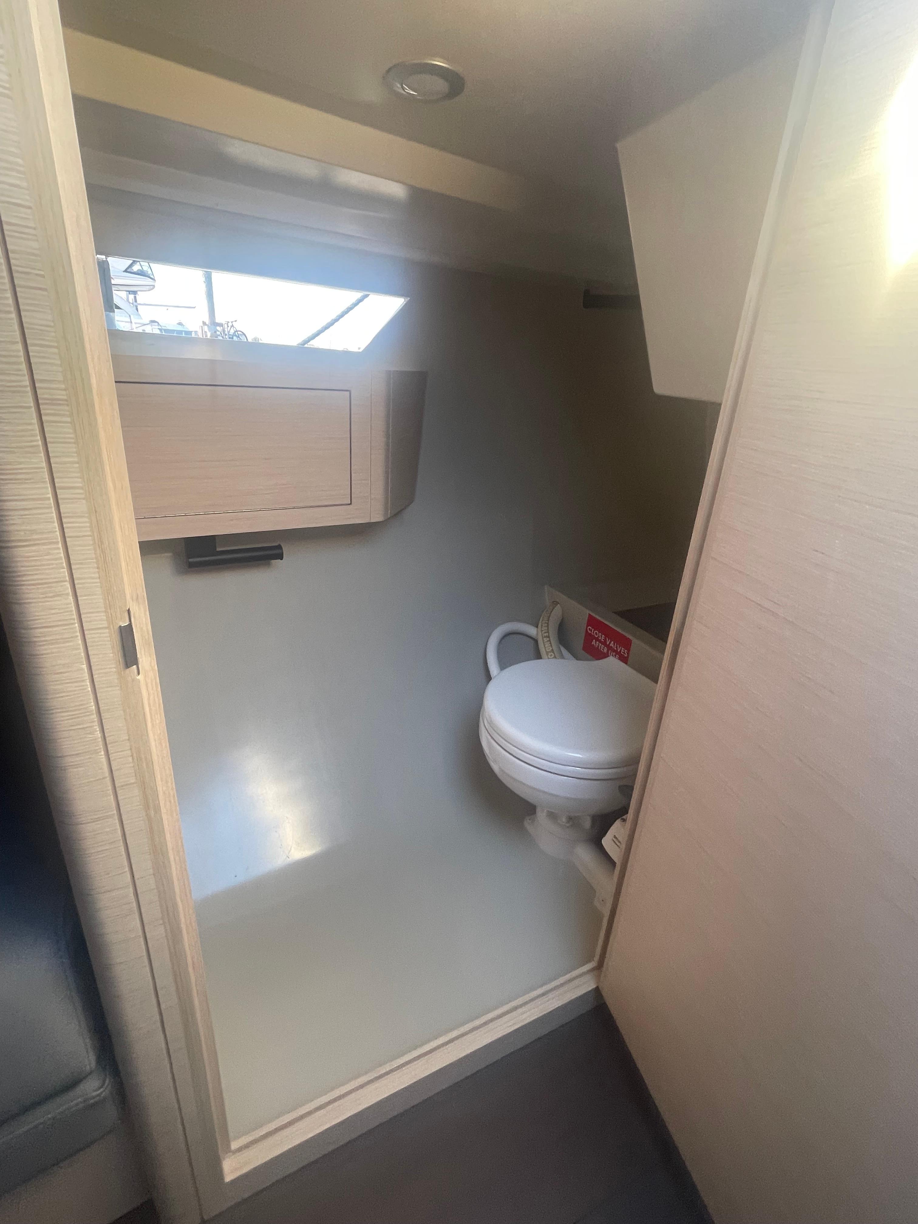 Compact bathroom in 2026 Saffier 33 Life yacht with modern fixtures and natural lighting.