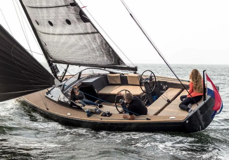  Yacht Photos Pics 2026 Saffier 33 Life yacht sailing with passengers on deck.