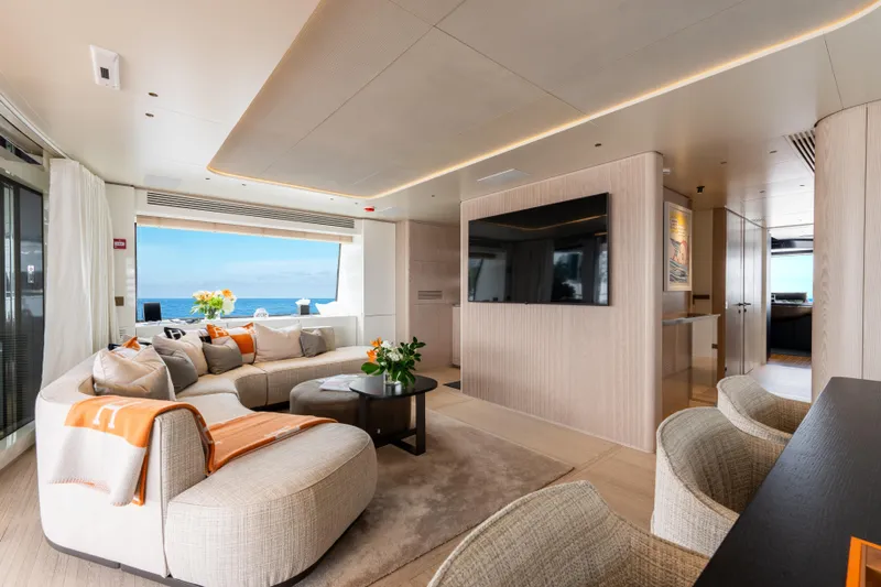 A+ Yacht Photos Pics Luxurious interior of 2024 Benetti Oasis yacht with modern furnishings and ocean view.