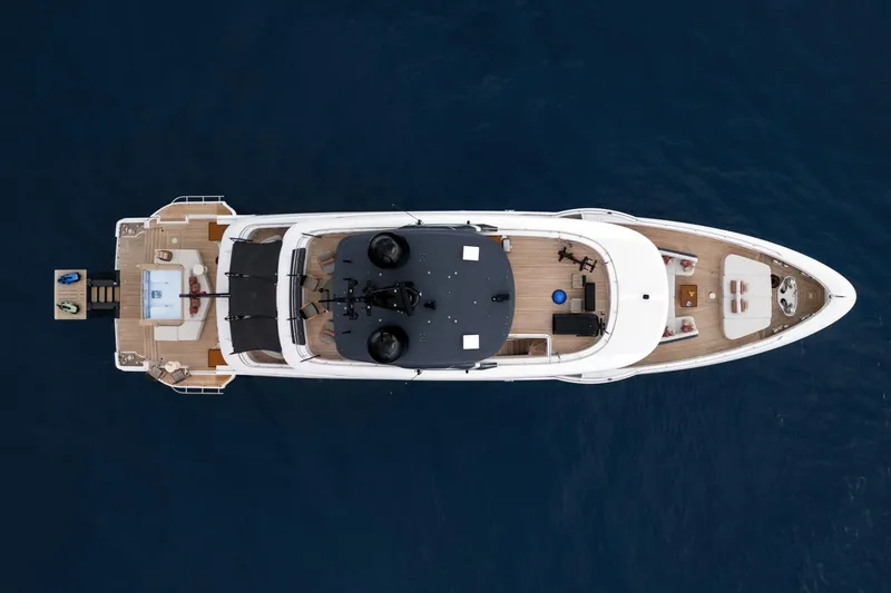 A+ Yacht Photos Pics Overhead view of 2024 Benetti Oasis yacht on deep blue water.