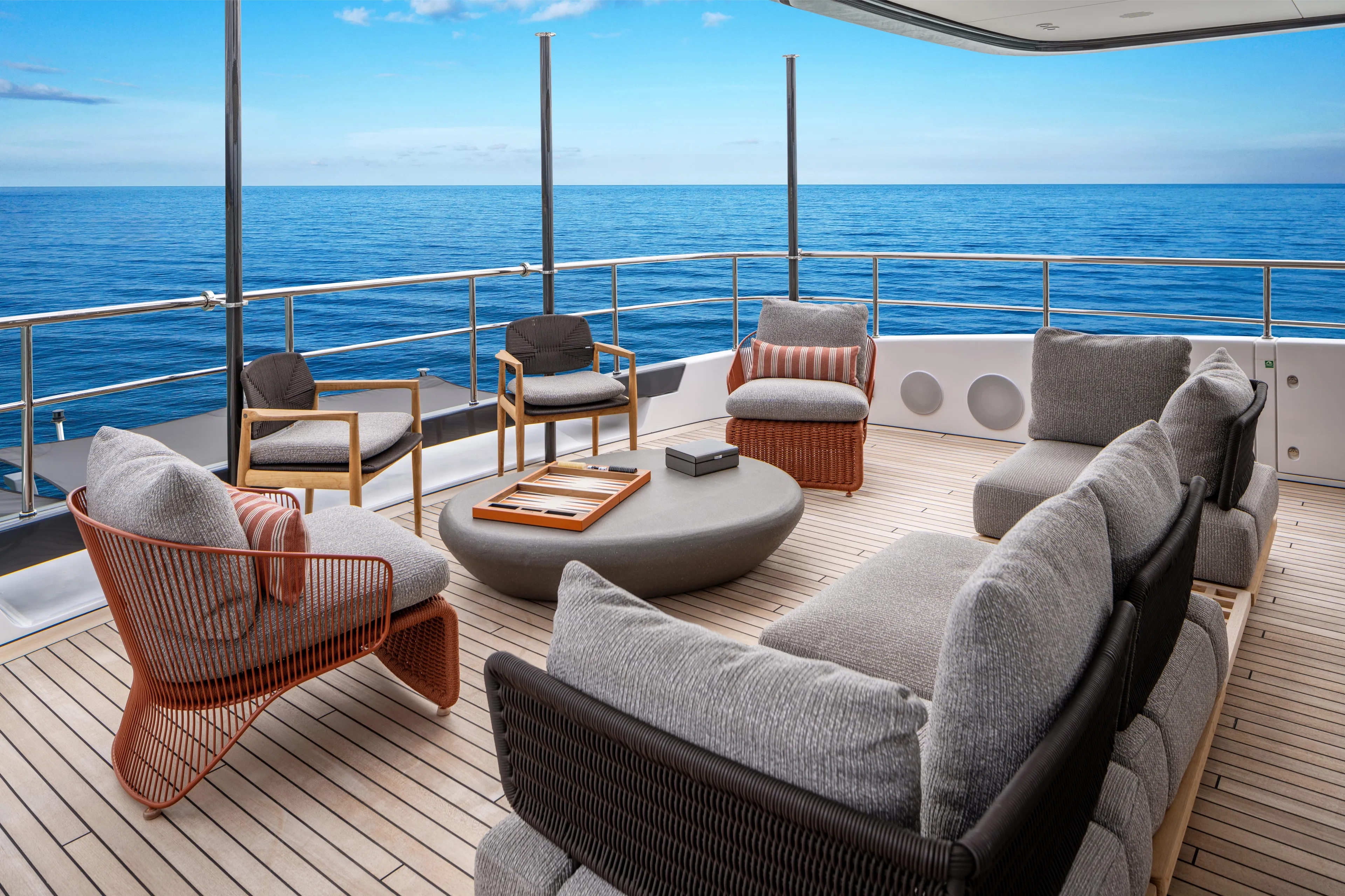 A+ Yacht Photos Pics Luxurious 2024 Benetti Oasis yacht deck with elegant seating and ocean view.