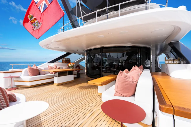A+ Yacht Photos Pics Luxurious 2024 Benetti Oasis yacht deck with elegant seating and ocean view.