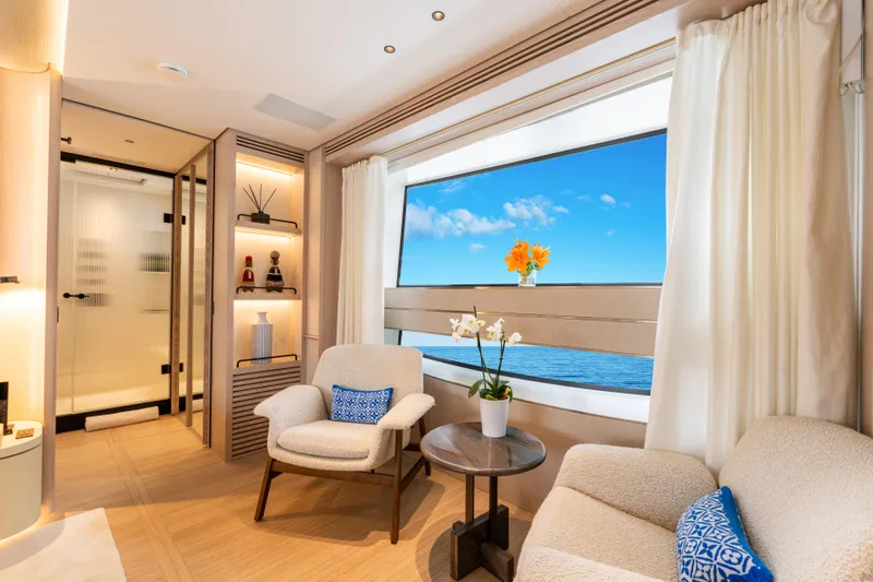 A+ Yacht Photos Pics Luxurious interior of 2024 Benetti Oasis yacht with ocean view and elegant decor.