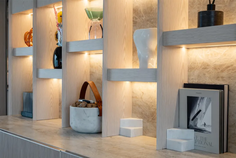 A+ Yacht Photos Pics Luxurious Benetti Oasis 2024 yacht interior with elegant shelving and decorative items.