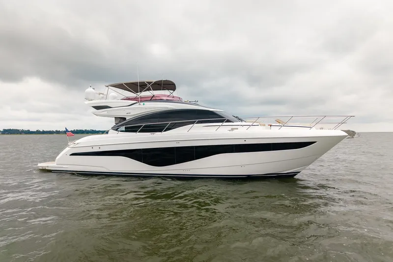 Regent Yacht Photos Pics Luxurious 2021 Princess S62 yacht cruising on open water under cloudy skies.