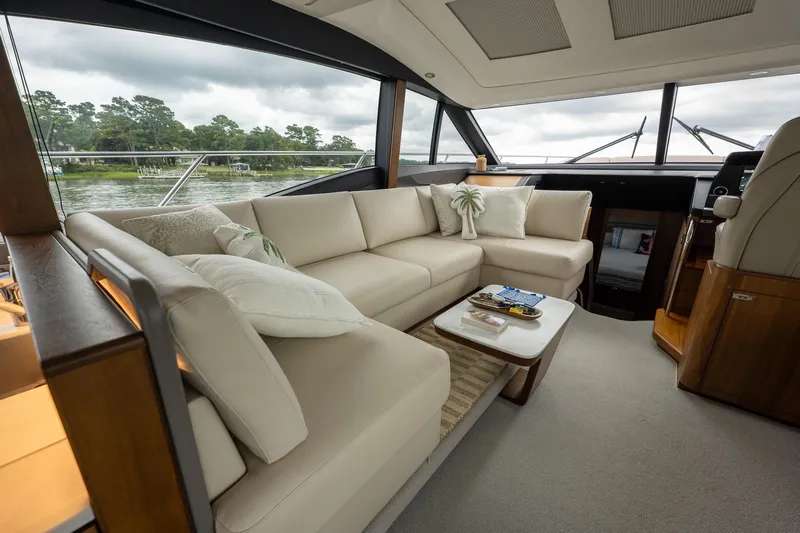 Regent Yacht Photos Pics Luxurious interior of 2021 Princess S62 yacht with elegant seating and scenic views.