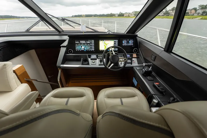 Regent Yacht Photos Pics Luxurious 2021 Princess S62 yacht cockpit with advanced navigation systems and plush seating.