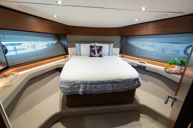 Regent Yacht Photos Pics Luxurious 2021 Princess S62 yacht bedroom with elegant decor and ambient lighting.