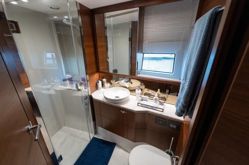 Regent Yacht Photos Pics Luxurious bathroom in 2021 Princess S62 yacht with modern fixtures and elegant design.