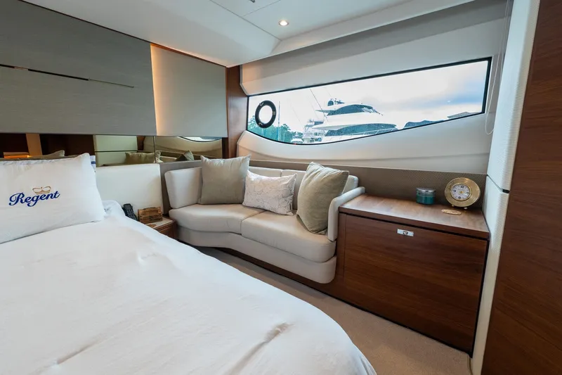 Regent Yacht Photos Pics Luxurious interior of 2021 Princess S62 yacht with elegant seating and large window view.