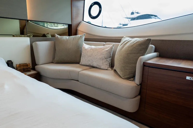 Regent Yacht Photos Pics Luxurious interior of 2021 Princess S62 yacht with elegant seating and cushions.