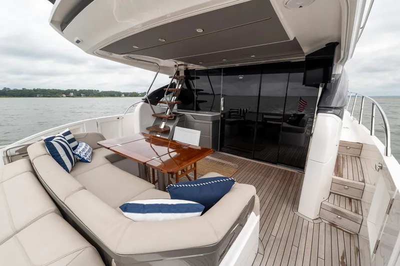 Regent Yacht Photos Pics Luxurious 2021 Princess S62 yacht deck with elegant seating and dining area.