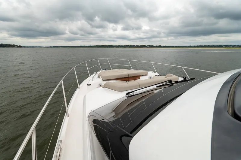 Regent Yacht Photos Pics Luxurious 2021 Princess S62 yacht cruising on a calm, cloudy day.