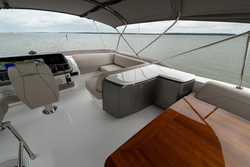 Regent Yacht Photos Pics Luxurious 2021 Princess S62 yacht interior with elegant seating and navigation controls.