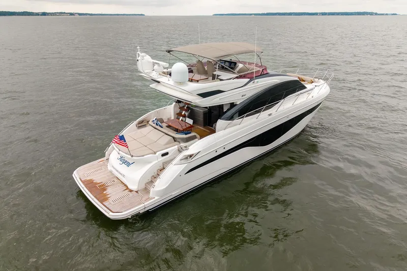Regent Yacht Photos Pics Luxurious 2021 Princess S62 yacht cruising on open water, featuring sleek design and spacious deck.