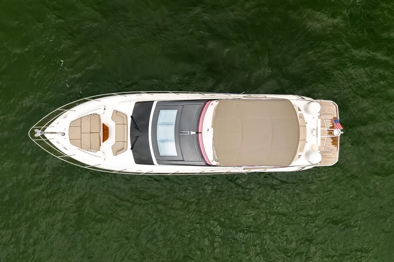 Regent Yacht Photos Pics Overhead view of 2021 Princess S62 yacht on green water.
