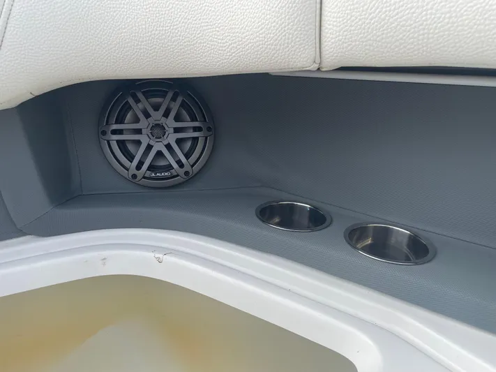  Yacht Photos Pics 2022 Cobalt 30SC boat interior with speaker and cup holders.