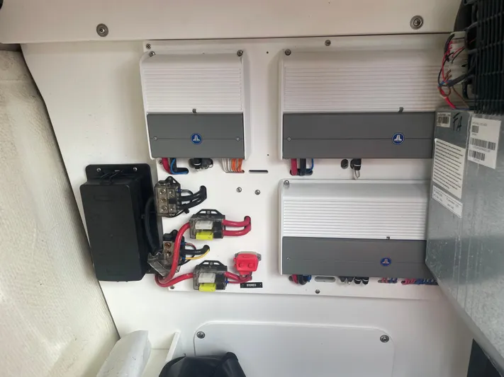  Yacht Photos Pics Electrical panel of a 2022 Cobalt 30SC boat with wiring and components.