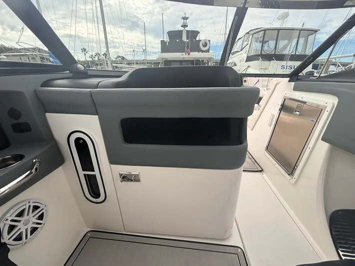  Yacht Photos Pics Interior view of 2022 Cobalt 30SC boat, featuring sleek seating and modern design elements.