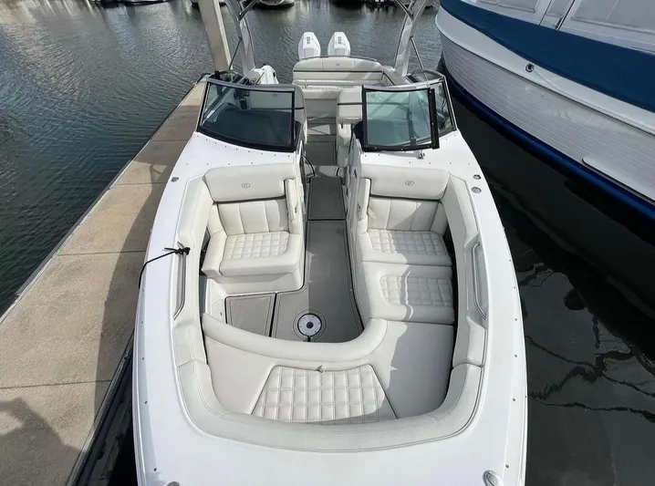  Yacht Photos Pics 2022 Cobalt 30SC boat with luxurious white seating docked at marina.