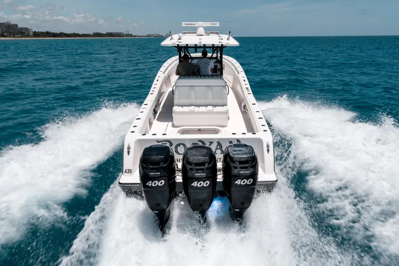  Yacht Photos Pics 2020 Invincible 39 Open Fisherman boat with four powerful engines cruising on the ocean.