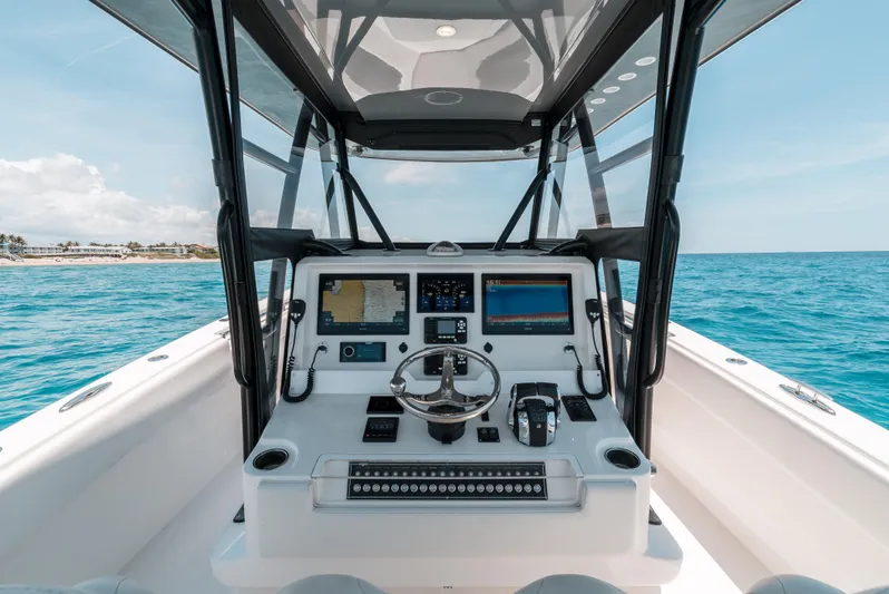  Yacht Photos Pics 2020 Invincible 39 Open Fisherman boat dashboard with ocean view.