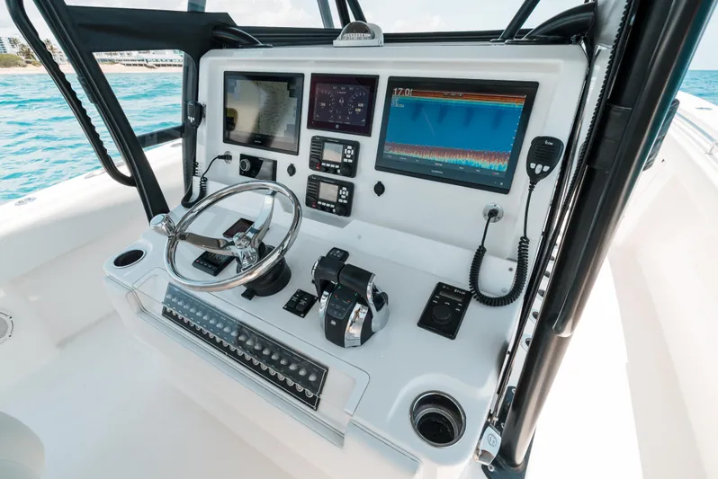  Yacht Photos Pics Control panel of 2020 Invincible 39 Open Fisherman boat with advanced navigation systems.