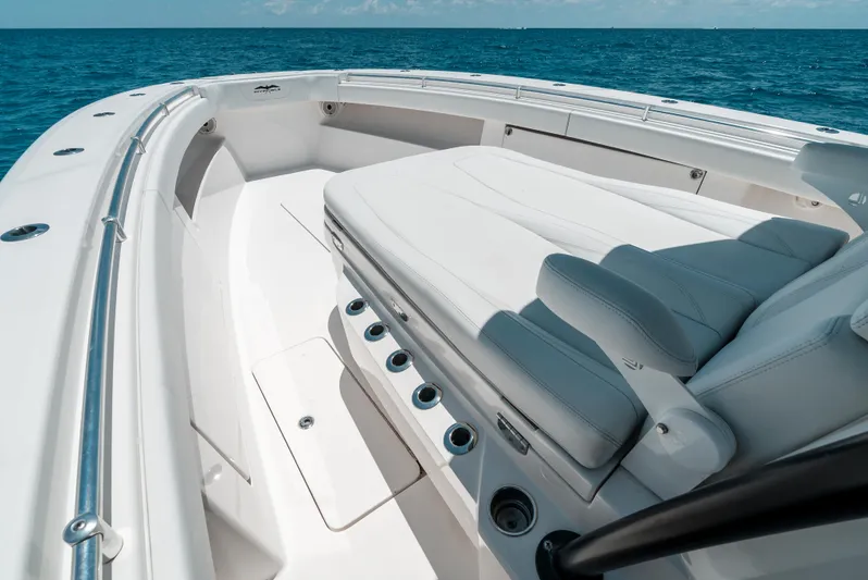  Yacht Photos Pics 2020 Invincible 39 Open Fisherman boat interior with white seating and ocean view.