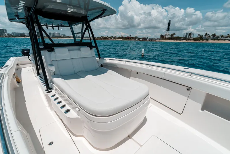  Yacht Photos Pics 2020 Invincible 39 Open Fisherman boat with luxurious seating on open water.