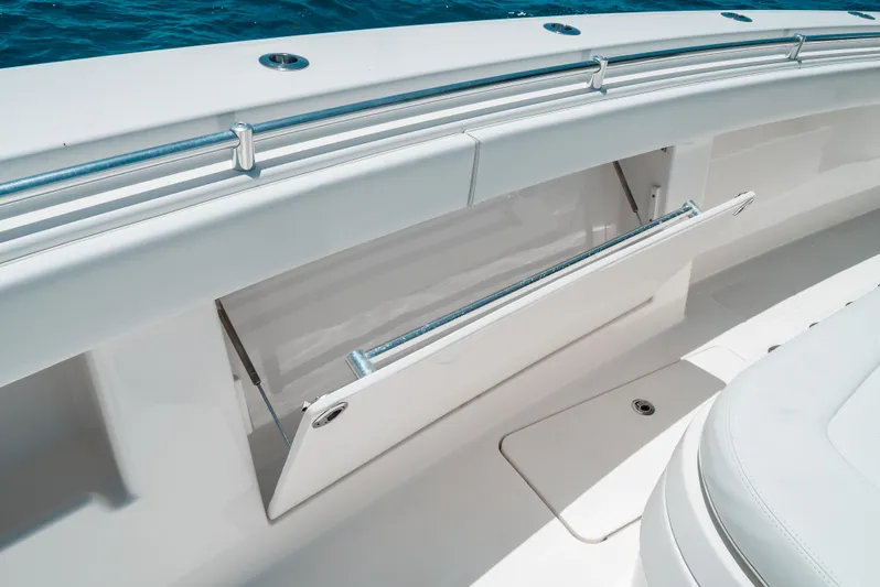  Yacht Photos Pics 2020 Invincible 39 Open Fisherman boat with open storage compartment, sleek white design.