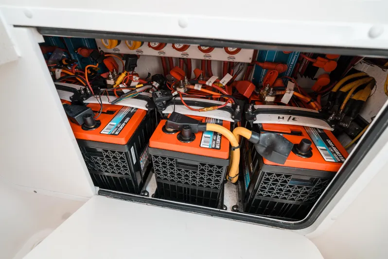 Yacht Photos Pics Battery compartment of 2020 Invincible 39 Open Fisherman, showcasing multiple marine batteries.