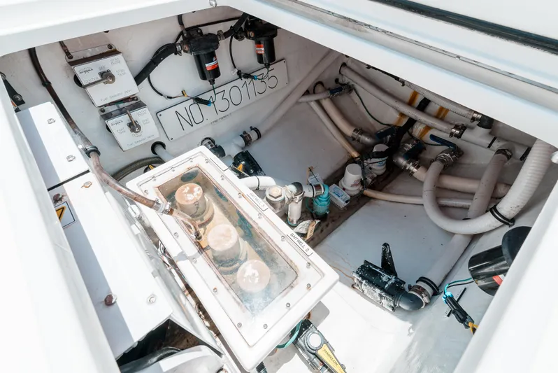  Yacht Photos Pics Engine compartment of 2020 Invincible 39 Open Fisherman with visible wiring and components.