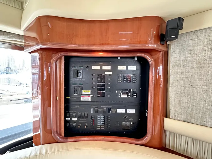 Slim Smitty Yacht Photos Pics Electrical control panel on a 2002 Sea Ray 560 Sedan Bridge yacht.