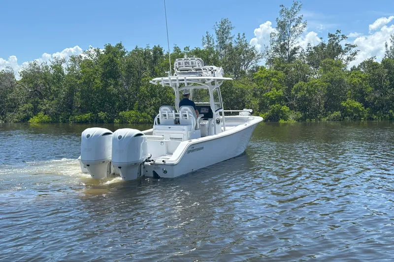  Yacht Photos Pics 2020 Sportsman Open 282 Center Console boat cruising on a sunny day.