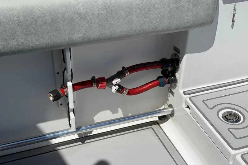 Yacht Photos Pics Red hoses and fittings on a 2020 Sportsman Open 282 Center Console boat.