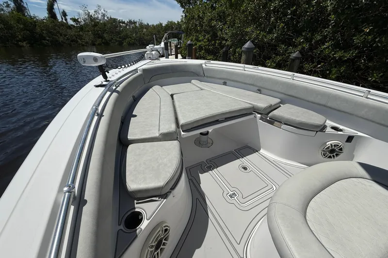  Yacht Photos Pics 2020 Sportsman Open 282 Center Console boat interior with cushioned seating and sleek design.
