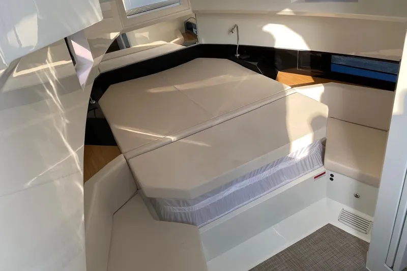 2025 Day 36 @ Cancun Yacht Photos Pics Interior cabin of 2025 De Antonio Yachts D36, featuring a cozy bed and modern design.