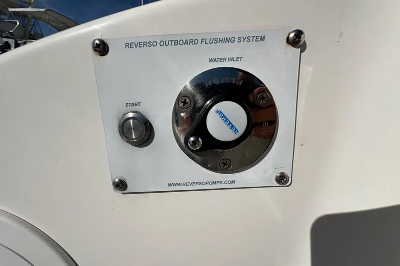 Wave Paver Yacht Photos Pics Reverso outboard flushing system on 2020 Pursuit OS 355 Offshore boat.