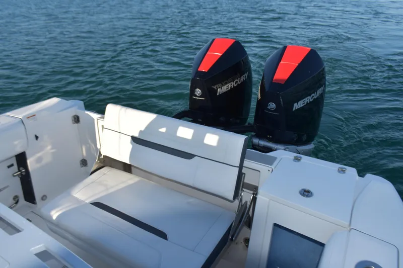  Yacht Photos Pics 2022 Blackfin 272 CC boat with dual Mercury engines on water.