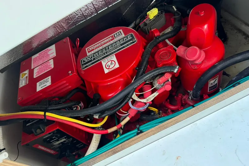 Pawsitive Attitude Yacht Photos Pics Engine compartment of a 2019 Jeanneau 895NC with Westerbeke generator.