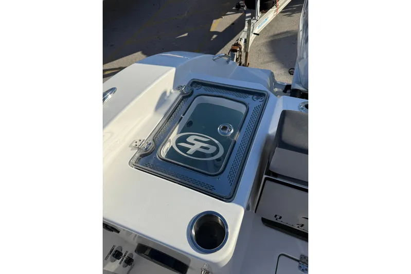 Yacht Photos Pics 2026 Sea Pro 292 DLX boat deck with logo and cup holder.