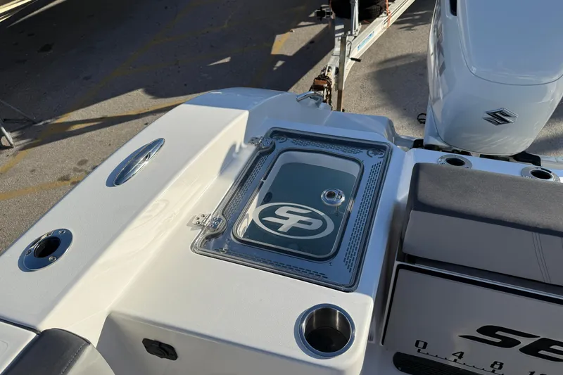  Yacht Photos Pics 2026 Sea Pro 292 DLX boat deck with logo and seating area.