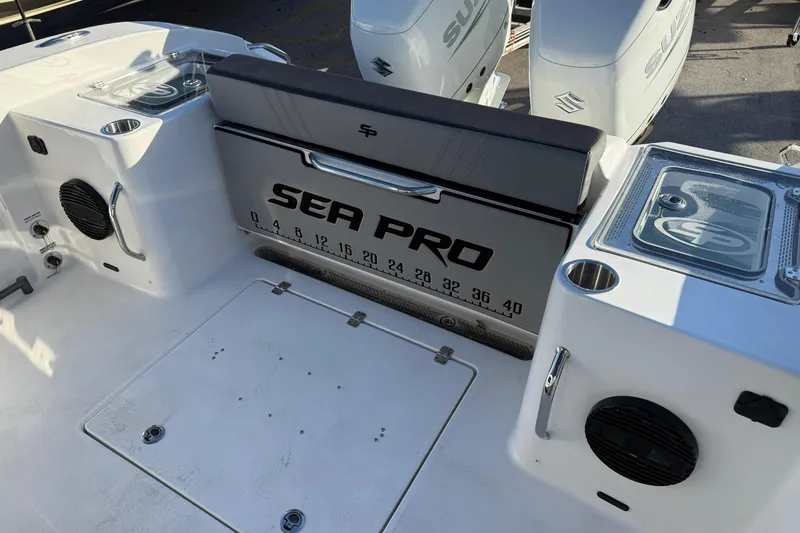  Yacht Photos Pics 2026 Sea Pro 292 DLX boat interior with branded seating and storage compartments.