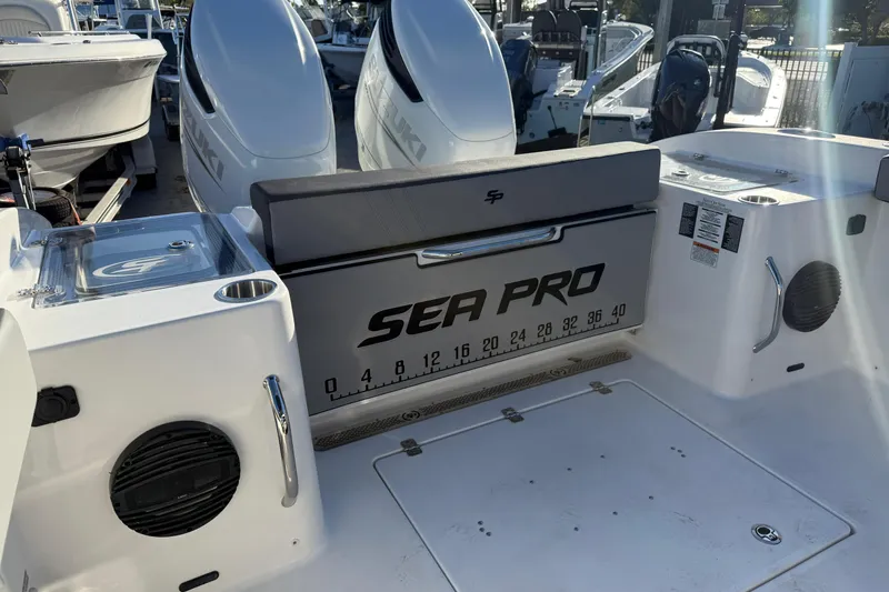  Yacht Photos Pics 2026 Sea Pro 292 DLX boat interior with dual Suzuki engines and branded seating.