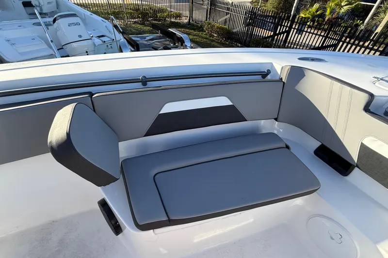 Yacht Photos Pics 2026 Sea Pro 292 DLX boat interior with gray seating and modern design.