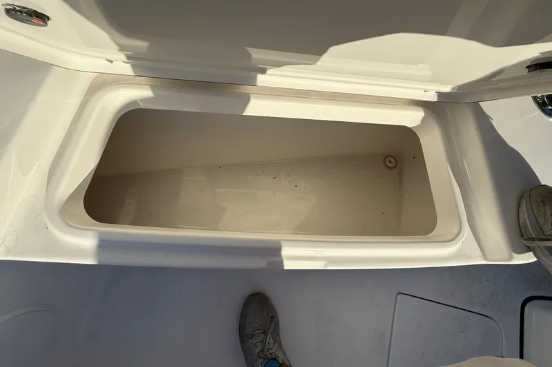  Yacht Photos Pics Open storage compartment on 2026 Sea Pro 292 DLX boat deck.