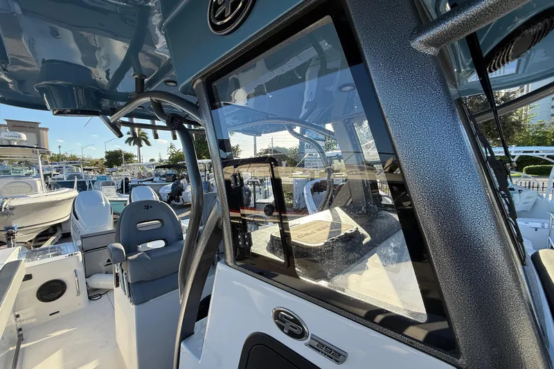  Yacht Photos Pics 2026 Sea Pro 292 DLX boat interior with modern seating and dashboard.