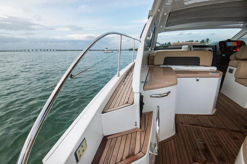  Yacht Photos Pics 2016 Azimut Atlantis 43 yacht with sleek deck design and luxurious interior on open water.