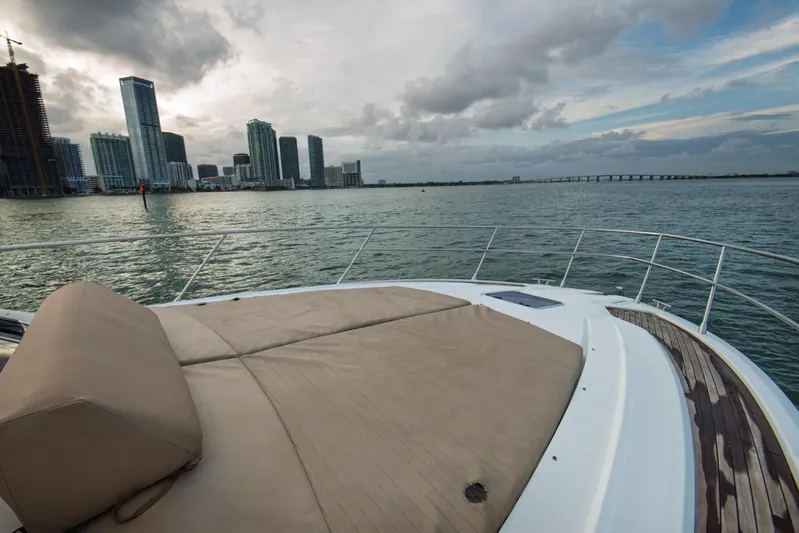  Yacht Photos Pics Luxurious 2016 Azimut Atlantis 43 yacht with city skyline and ocean view.